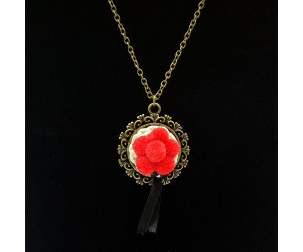 Schwarzwaldmädel Kette bronze mit Bollenhut rot