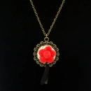 Schwarzwaldmädel Kette bronze mit Bollenhut rot