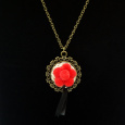 Schwarzwaldm&auml;del Kette bronze mit Bollenhut rot